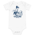 Lacrosse baby bodysuit with the GO2X Feeding Goals design, a woman feeding a baby in a high chair with a lacrosse stick
