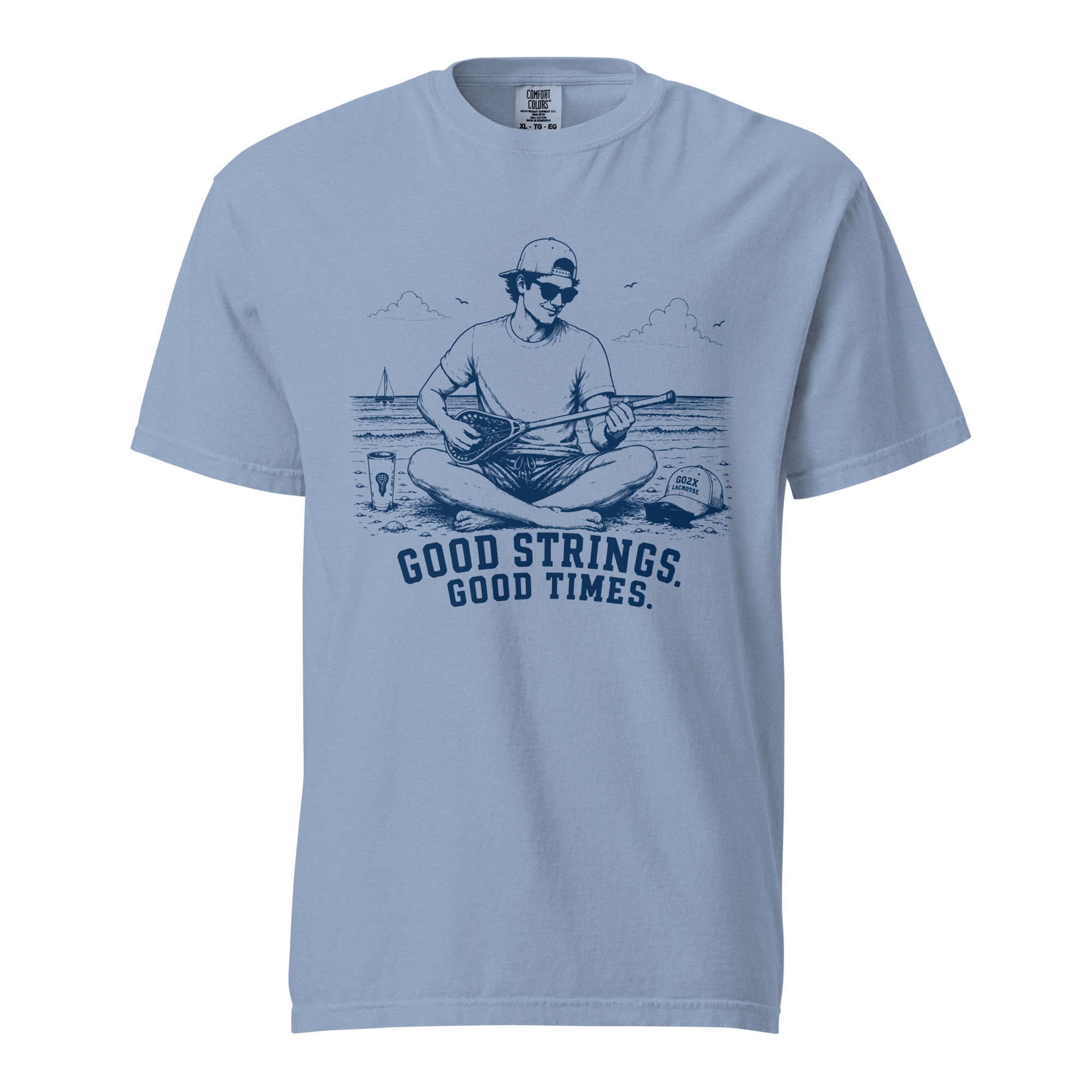 Lacrosse shirt with the GO2X Good Strings Good Times design, a man on the beach playing a lacrosse stick like a guitar