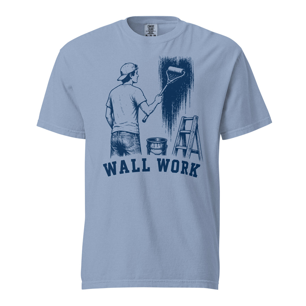 Lacrosse shirt with the GO2X Wall Work design, a man painting a wall with a lacrosse-head paint roller
