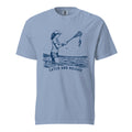 Lacrosse shirt with the GO2X Catch and Release design, a girl on a dock holding a lacrosse stick with a fish hanging from the head