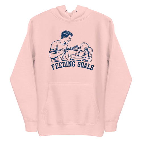 Lacrosse hoodie with the GO2X Feeding Goals design, a man feeding a baby in a high chair with a lacrosse stick
